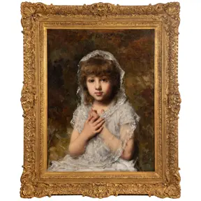 Academic-style portrait of a young girl in a white dress and veil, hands clasped, in an ornate gilded frame.