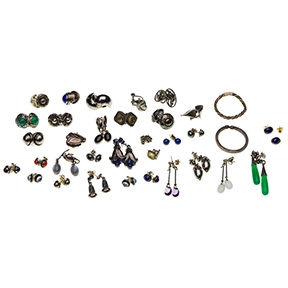 Assortment of Georg Jensen sterling silver pierced and clip-on earrings with modernist designs.