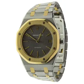 Audemars Piguet Royal Oak two-tone stainless steel and 18k yellow gold wristwatch with octagonal bezel and gray tapisserie dial.