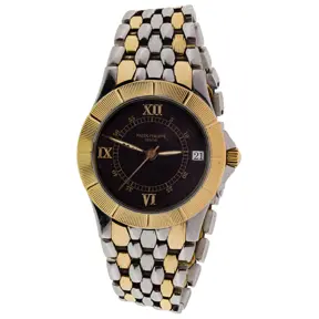 Patek Philippe Neptune two-tone stainless steel and 18k gold wristwatch with integrated bracelet and Roman numeral dial.