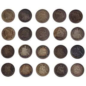 Partial set of Liberty Seated half dimes arranged in display.