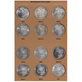 Collection of Morgan silver dollars displayed in album.