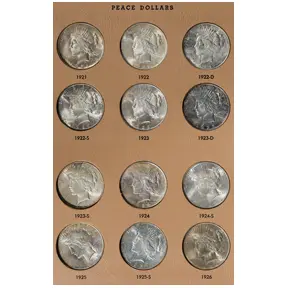 Complete Peace silver dollar set in album.