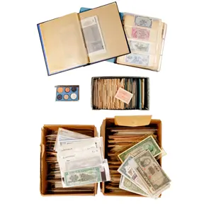 Assorted world paper currency including German Notgeld and album pages.